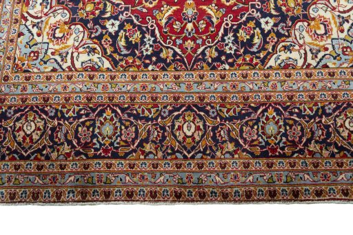Full view of 2000s Kashan rug from Iran / Persia, 355 × 243 cm in Red tones