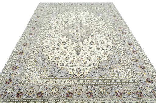Surface texture of 2000s Kashan rug with natural Wool and intricate pattern