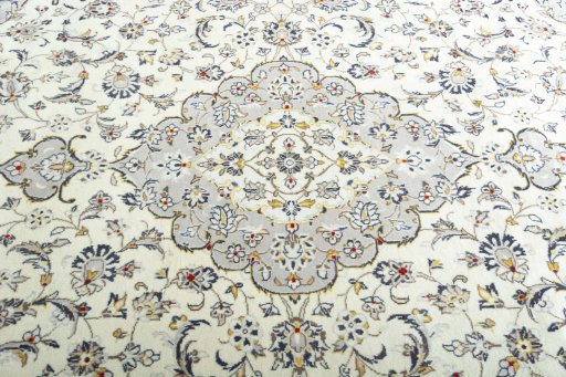 Central medallion detail of 2000s Kashan rug from Iran / Persia