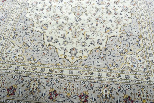Close-up detail of 2000s Kashan rug from Iran / Persia showing Wool weave