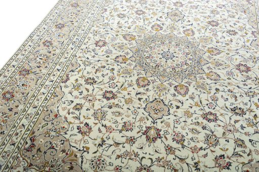Backside of handmade 2000s Kashan rug showing knot structure and weave density