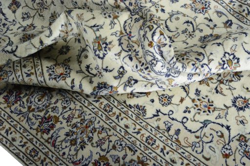 Surface texture of New Kashan rug with natural Wool and intricate pattern