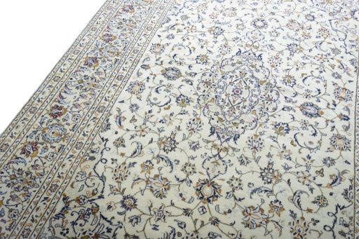 Backside of handmade New Kashan rug showing knot structure and weave density