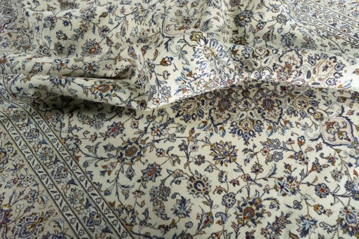 Surface texture of 2000s Kashan rug with natural Wool and intricate pattern