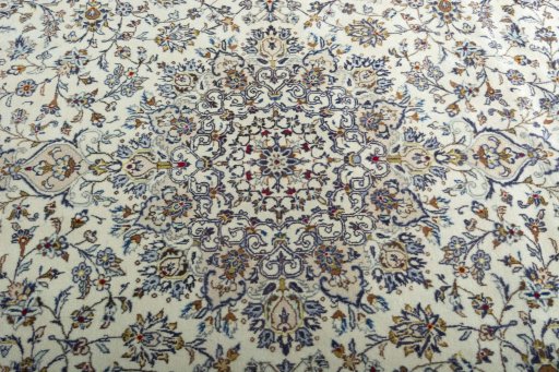 Central medallion detail of 2000s Kashan rug from Iran / Persia