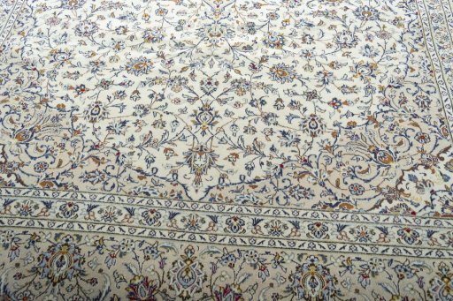Close-up detail of 2000s Kashan rug from Iran / Persia showing Wool weave
