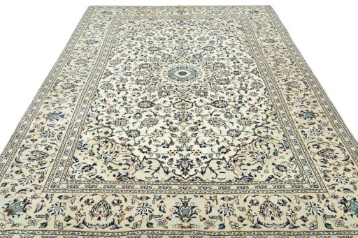 Surface texture of 2000s Kashan rug with natural Wool and intricate pattern