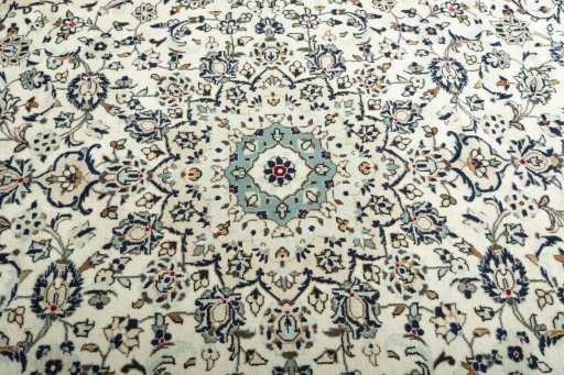 Central medallion detail of 2000s Kashan rug from Iran / Persia