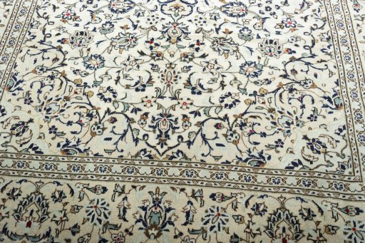 Close-up detail of 2000s Kashan rug from Iran / Persia showing Wool weave