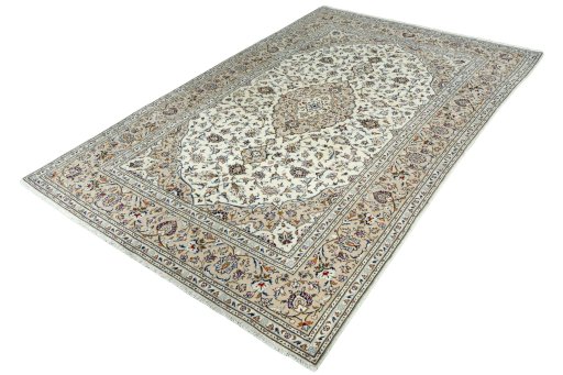 Corner detail of 2000s Kashan rug showing border pattern and Wool pile