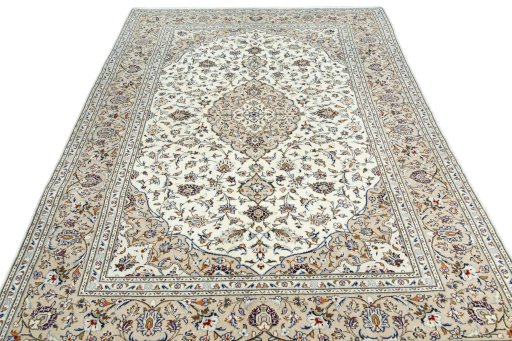 Surface texture of 2000s Kashan rug with natural Wool and intricate pattern