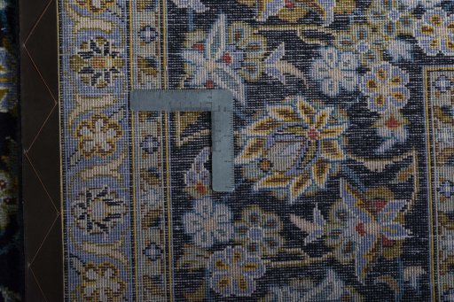 Central medallion detail of 2000s Kashan rug from Iran / Persia