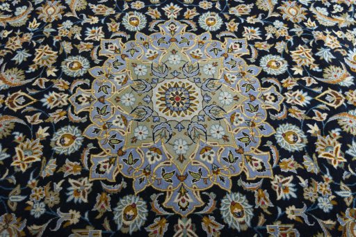 Central medallion detail of 2000s Kashan rug from Iran / Persia