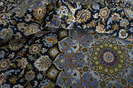 Surface texture of New Kashan rug with natural Wool and intricate pattern