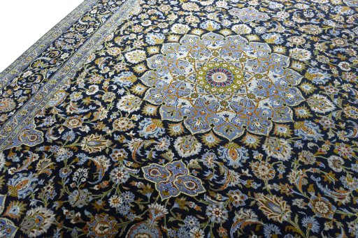 Backside of handmade New Kashan rug showing knot structure and weave density
