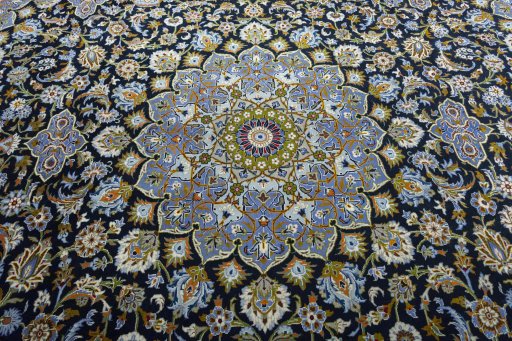 Central medallion detail of New Kashan rug from Iran / Persia