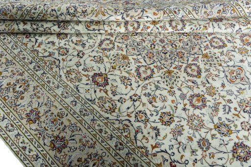 Close-up detail of 2000s Kashan rug from Iran / Persia showing Wool weave