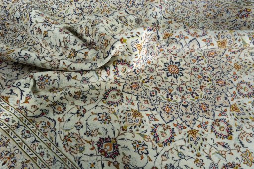 Surface texture of 2000s Kashan rug with natural Wool and intricate pattern