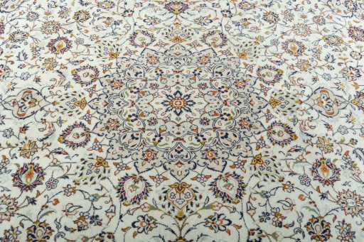 Central medallion detail of 2000s Kashan rug from Iran / Persia