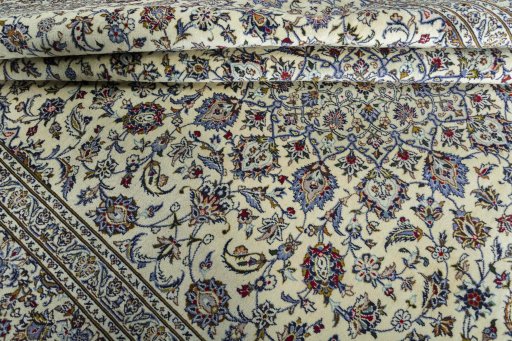 Close-up detail of New Kashan rug from Iran / Persia showing Wool weave