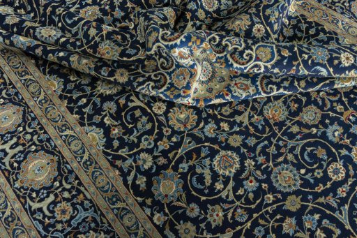 Surface texture of 2000s Kashan rug with natural Wool and intricate pattern