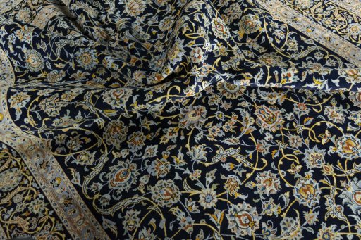 Surface texture of 2000s Kashan rug with natural Wool and intricate pattern