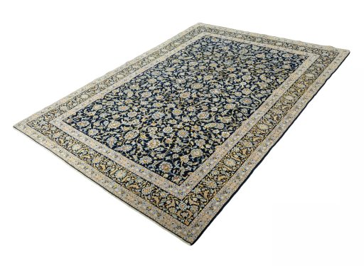 Corner detail of 2000s Kashan rug showing border pattern and Wool pile