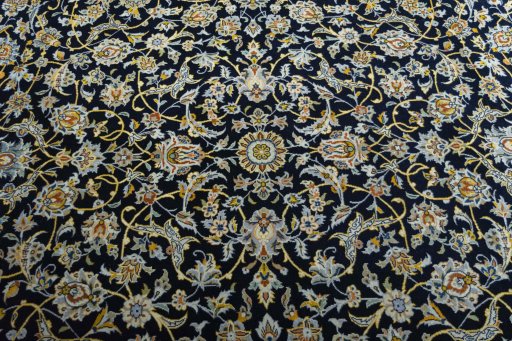 Central medallion detail of 2000s Kashan rug from Iran / Persia