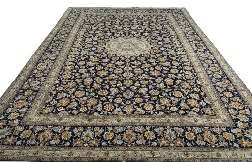 Surface texture of 2000s Kashan rug with natural Wool and intricate pattern