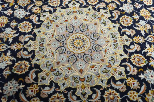 Central medallion detail of 2000s Kashan rug from Iran / Persia