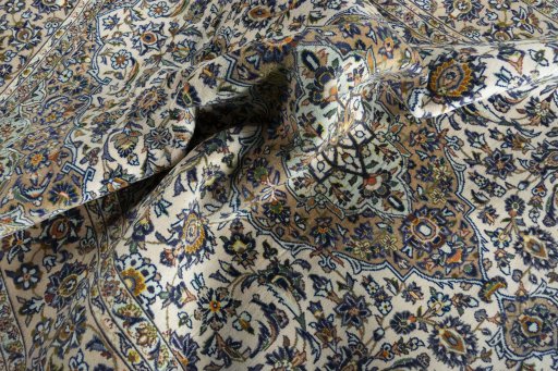 Surface texture of 2000s Kashan rug with natural Cork and intricate pattern