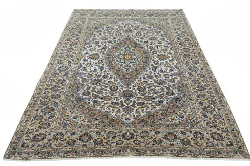 Surface texture of 2000s Kashan rug with natural Cork and intricate pattern