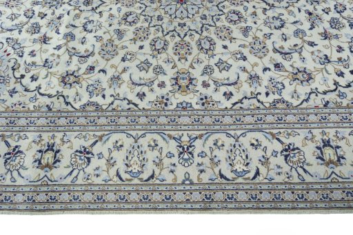 Surface texture of 2000s Kashan rug with natural Wool and intricate pattern
