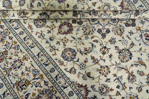 Close-up detail of 2000s Kashan rug from Iran / Persia showing Wool weave