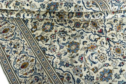 Close-up detail of 2000s Kashan rug from Iran / Persia showing Wool weave