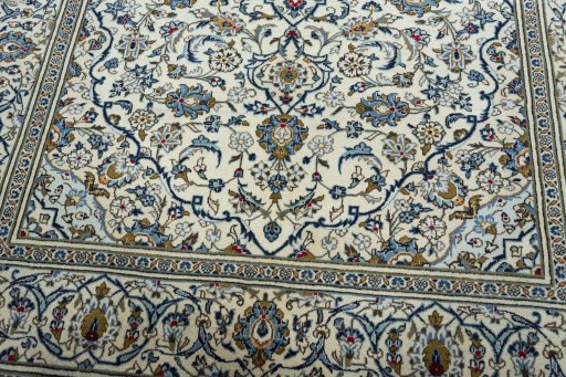 Close-up detail of 2000s Kashan rug from Iran / Persia showing Wool weave