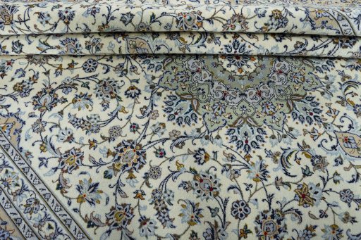 Close-up detail of 2000s Kashan rug from Iran / Persia showing Wool weave