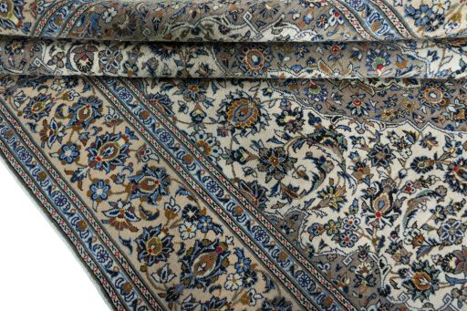 Close-up detail of 2000s Kashan rug from Iran / Persia showing Wool weave