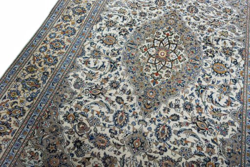 Backside of handmade 2000s Kashan rug showing knot structure and weave density