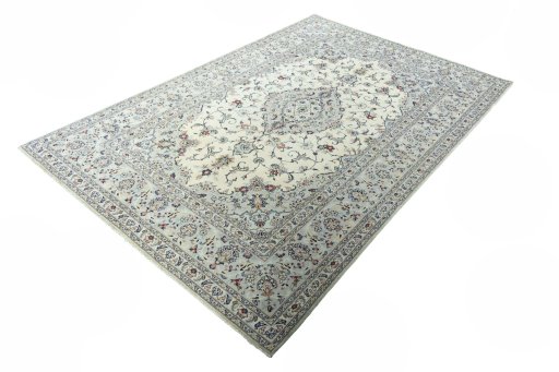 Corner detail of New Kashan rug showing border pattern and Wool pile