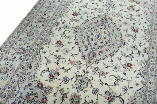 Backside of handmade New Kashan rug showing knot structure and weave density