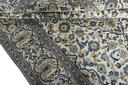 Close-up detail of 2000s Kashan rug from Iran / Persia showing Wool weave