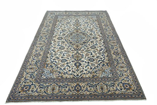 Surface texture of 2000s Kashan rug with natural Wool and intricate pattern