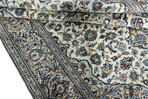 Close-up detail of 2000s Kashan rug from Iran / Persia showing Wool weave