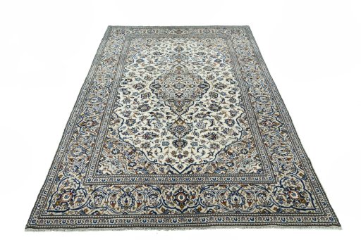 Surface texture of 2000s Kashan rug with natural Wool and intricate pattern