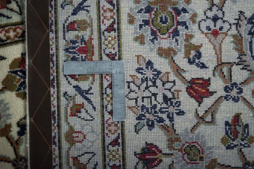 Close-up detail of New Kashan rug from Iran / Persia showing Wool weave