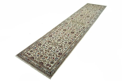 Corner detail of New Kashan rug showing border pattern and Wool pile