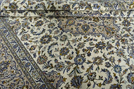 Close-up detail of 2000s Kashan rug from Iran / Persia showing Wool weave