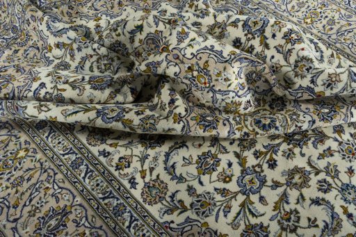 Surface texture of 2000s Kashan rug with natural Wool and intricate pattern