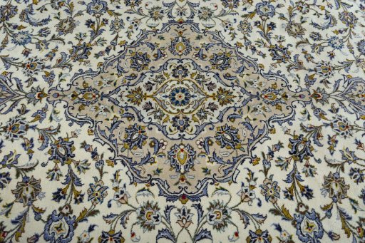 Central medallion detail of 2000s Kashan rug from Iran / Persia